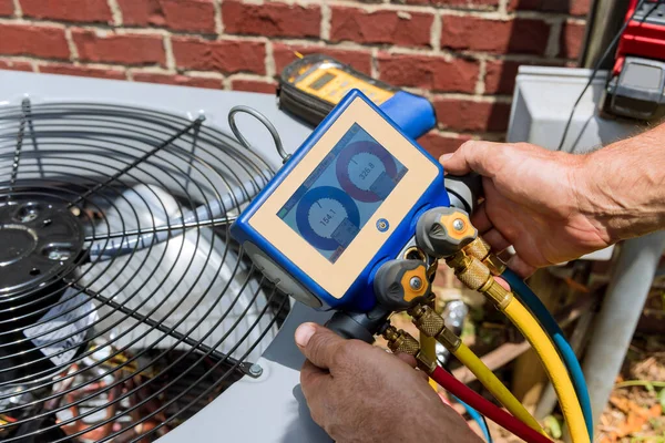 Electrician working on electrical panel